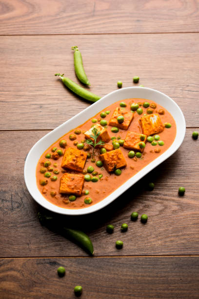 istock Green peas or matar paneer curry recipe, served in a bowl. selective focus 1078079312