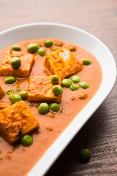 istock Green peas or matar paneer curry recipe, served in a bowl. selective focus 1078079486