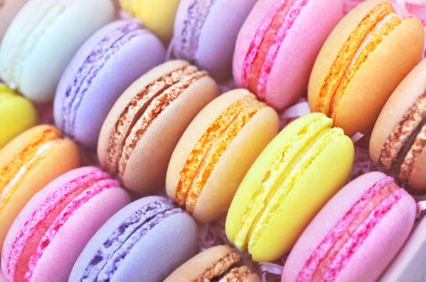 istock Colorful macarons on bright festive background 1078080896