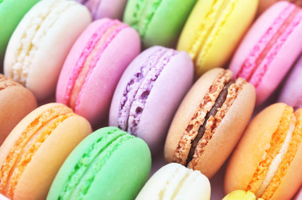 istock Colorful macarons on bright festive background 1078081312