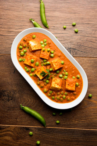 istock Green peas or matar paneer curry recipe, served in a bowl. selective focus 1078081606