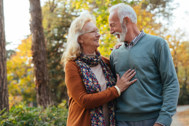 istock Senior couple taking a walk in the park 1078081848