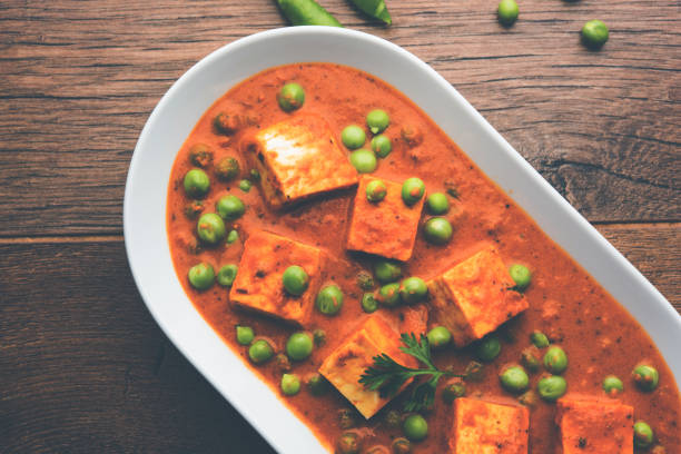 istock Green peas or matar paneer curry recipe, served in a bowl. selective focus 1078082024
