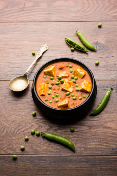 istock Green peas or matar paneer curry recipe, served in a bowl. selective focus 1078082102