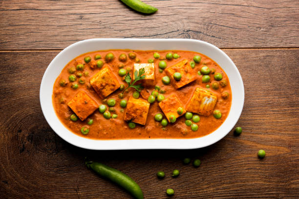 istock Green peas or matar paneer curry recipe, served in a bowl. selective focus 1078083572