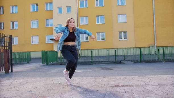 istock Young Woman Dancing Outside 1078083740