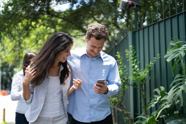 istock Coworker walking outdoors at break time 1078083756