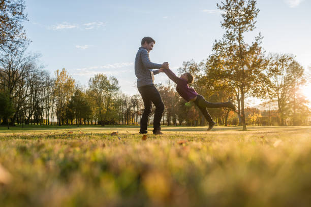 istock Happy young father playing with his toddler son 1078092888