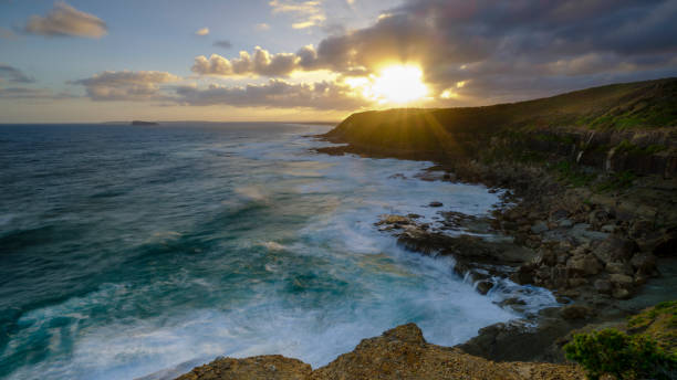 istock Summer sunset from Wybung Head in the Munmorrah State Conservation Area, Central Coast, NSW, Australia 1078093662