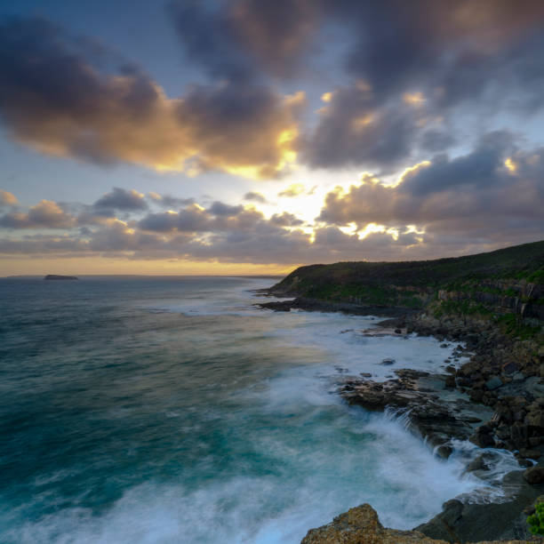 istock Summer sunset from Wybung Head in the Munmorrah State Conservation Area, Central Coast, NSW, Australia 1078093716