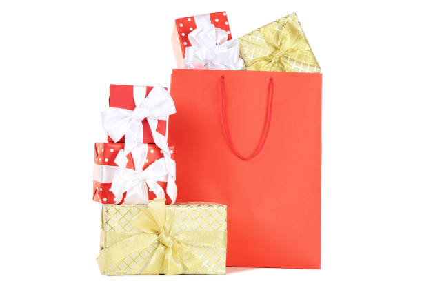 istock Shopping bag with gift boxes isolated on white background 1078096276