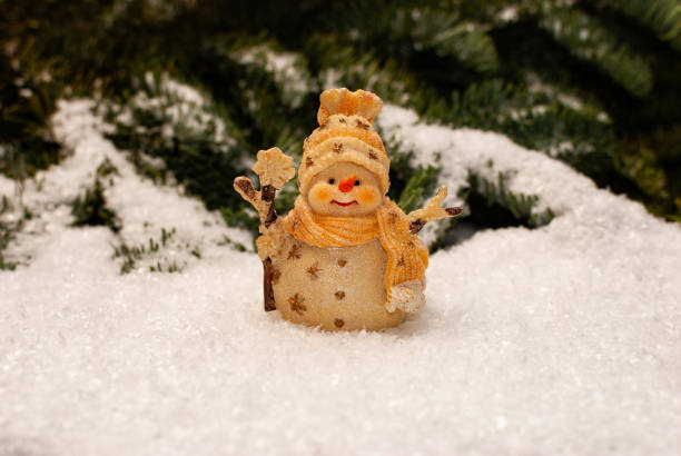 istock A snowman standing in the snow 1078096638