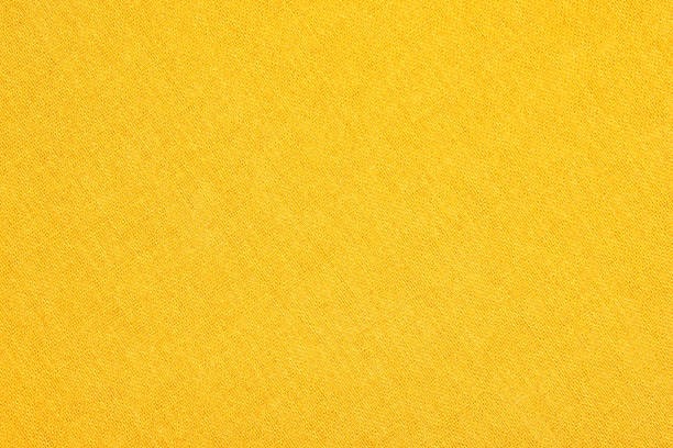 istock Abstract yellow fabric texture background. Book cover. 1078099764