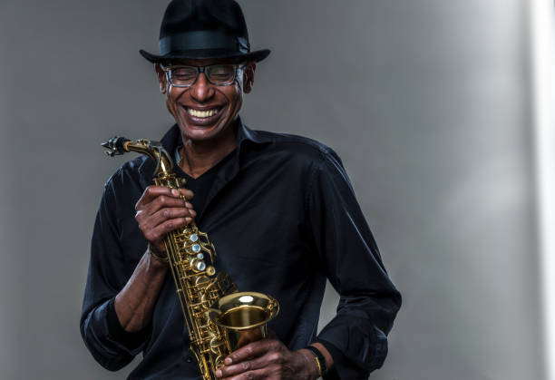 istock Musician with saxophone and big smile 1078100214