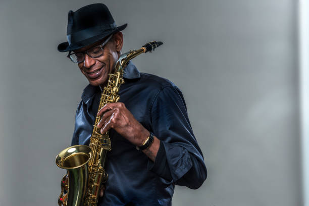 istock Musician with saxophone and big smile 1078100450