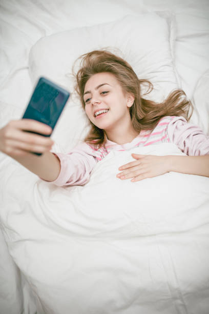 istock Selfie In Cozy Bed 1078107866