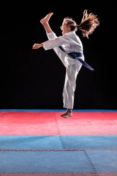 istock Girl practicing martial arts 1078114240
