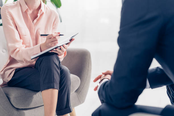 istock cropped image of journalist taking notes during interview with businessman in office 1078115484