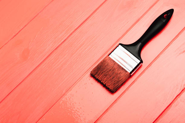 istock Half painted Living Coral wooden board 1078117250
