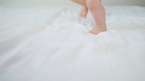 istock Cute Baby Playing in her Crib at Home 1078120730