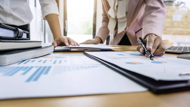 istock Group of coworkers work together office, business making conversation with partner presentation project at meeting working and analysis, Idea presentation and strategy plan of business investment 1078121320