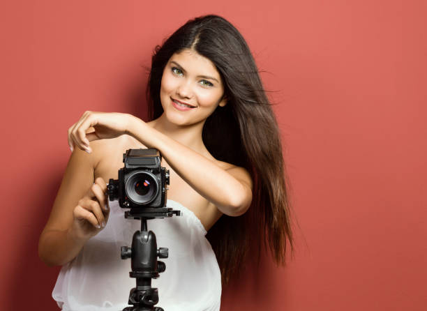 istock Young female photographer 1078124938