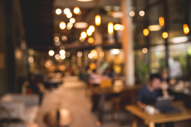 istock Blurred of coffee shop or modern library with bokeh lights. 1078125802