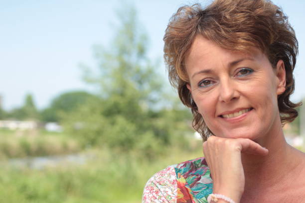 istock Beautiful woman outside 1078131814