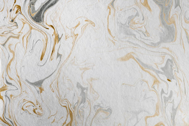 istock marble ink paper texture gold gray white 1078133928