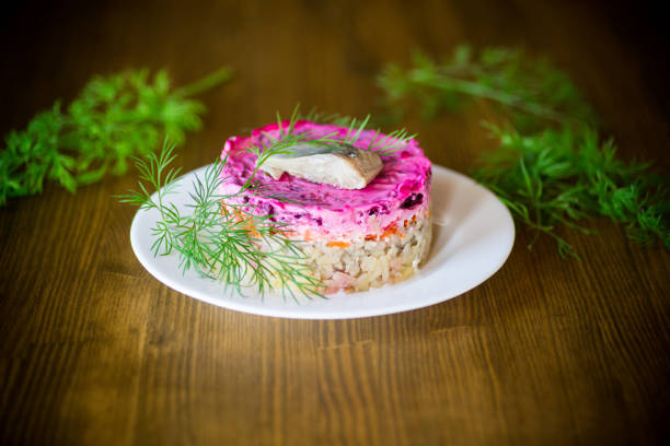istock layered salad of boiled vegetables with beets and herring 1078134868