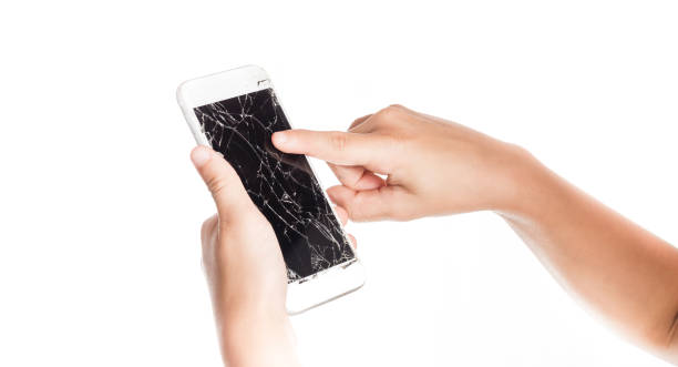 istock angry little girl holding a smartphone with broken screen 1078137544