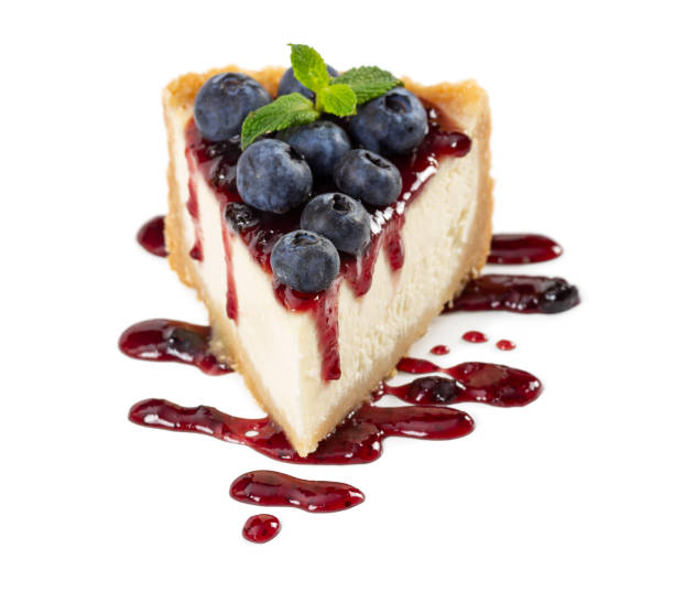 istock Piece of cheesecake with blueberries and mint 1078140396