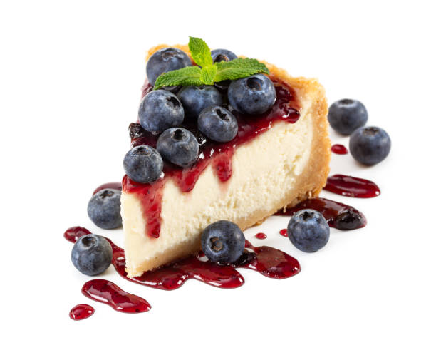 istock Piece of cheesecake with blueberries and mint isolated on white 1078140400