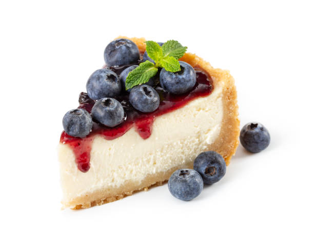 istock Piece of cheesecake with blueberries and mint isolated on white 1078140404