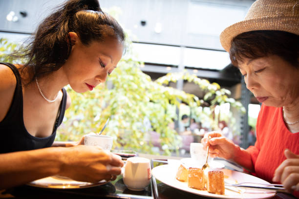 istock Two people enjoying coffee and cake 1078140520