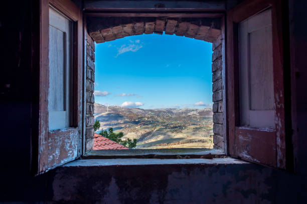 istock Window View in an Abandoned Ghost Town in Southern Italy 1078152934