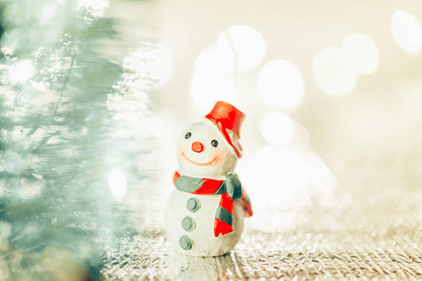 istock A miniature Snowman on Christmas background 1078155892