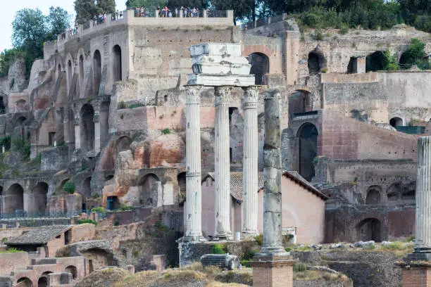 The three Corinthian columns date to the era of Tiberius or Hadrian, Rome, Italy