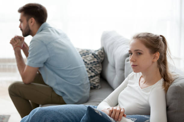 istock Upset husband and wife sit separately after fight 1078159382