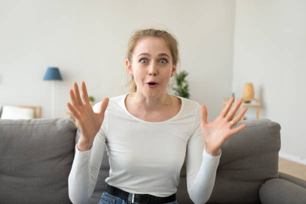 istock Excited young woman emotionally talk making video call 1078159454
