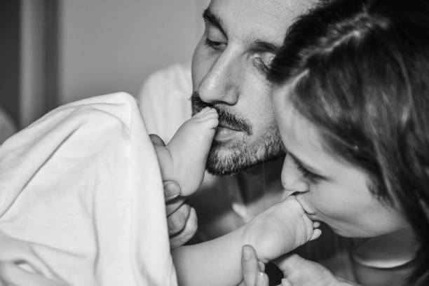 istock Young mother and father with newborn 1078160226