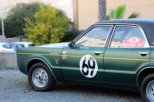 Roquebrune-Cap-Martin, France - December 5, 2018: Green Car Ford Taunus GXL Coupe Parked On The Street , French Riviera, France, Europe, Closeup View