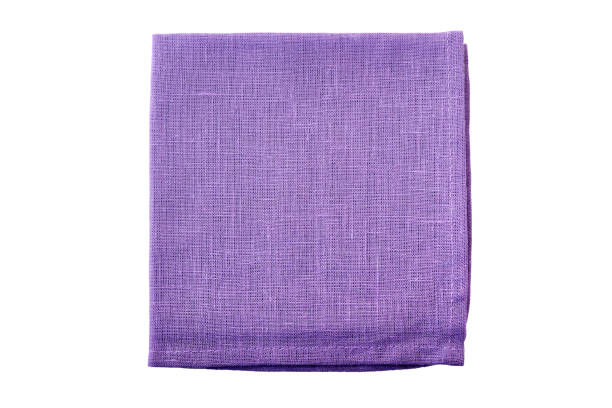 istock Pale violet folded textile napkin on white 1078160310