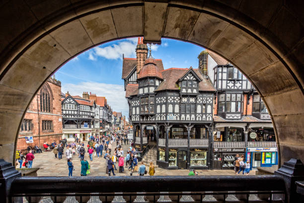 Framed view of half timbered tudor buildings in Bridge Street in Chester, Cheshire, UK stock photo