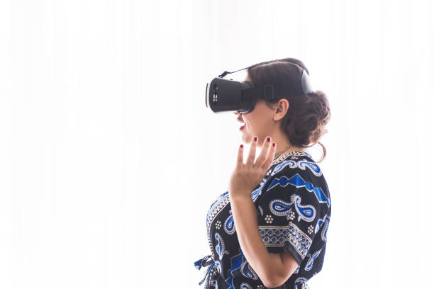 istock Woman wearing vr headset 1078162204