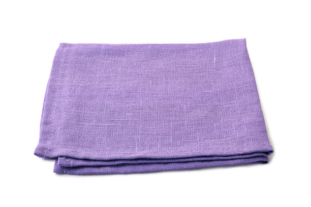 istock Folded pale violet textile napkin on white background 1078162436
