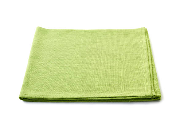 istock Pale green folded textile napkin on white 1078162696