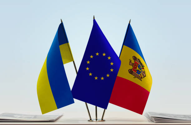 Flags of Ukraine European Union and Moldova Flags of Ukraine and Moldova with a EU flag in the middle moldova stock pictures, royalty-free photos & images