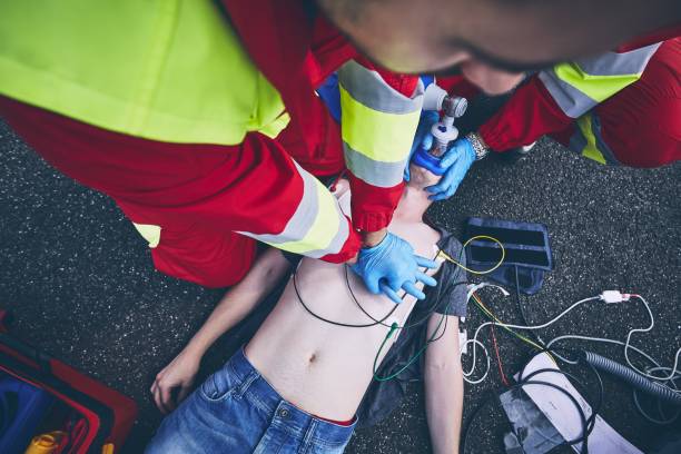 istock Cardiopulmonary resuscitation on road 1078165088