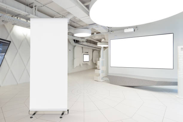 istock Blank roll up banner stand in contemporary office interior 1078166676